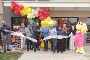 Business leaders at a ribbon cutting